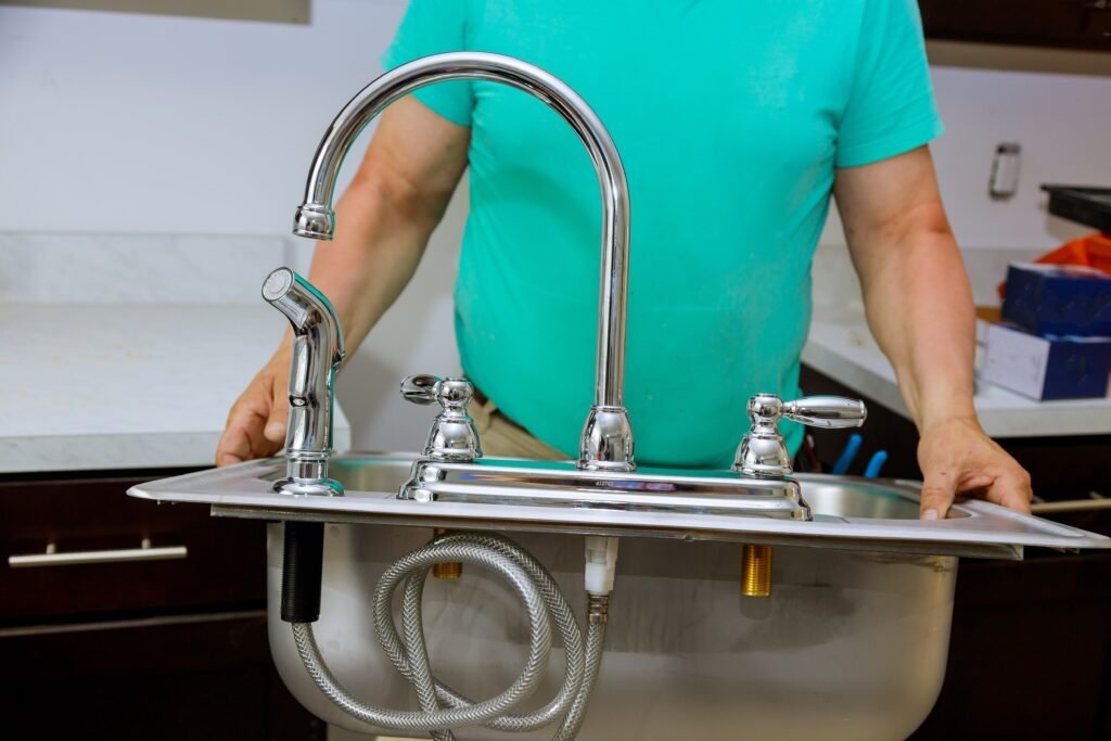 installation of kitchen sink by fine kitchen remodeling charlotte nc